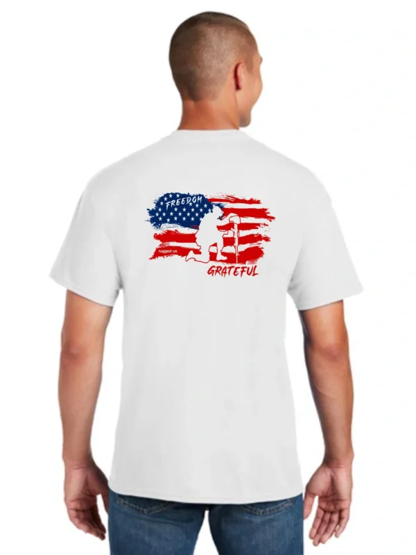 A man wearing white shirt with american flag on it.