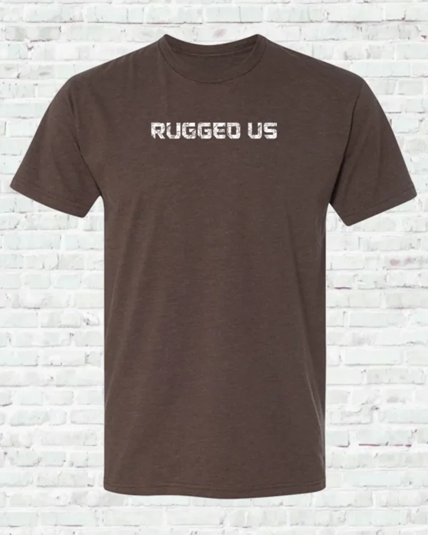 A brown shirt with the words rugged us written on it.