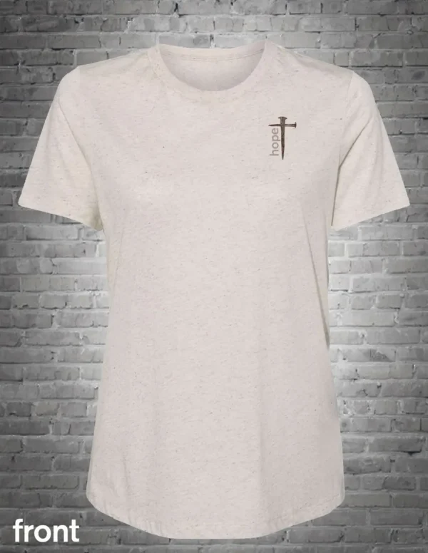 A white t-shirt with a cross on it.