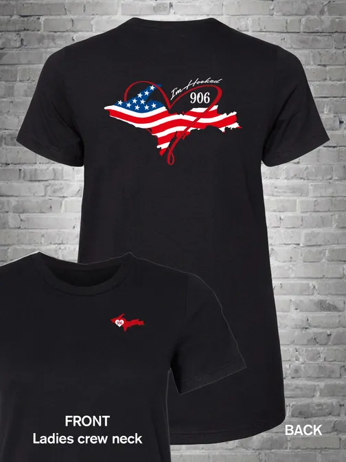 A black t-shirt with an american flag and heart design.