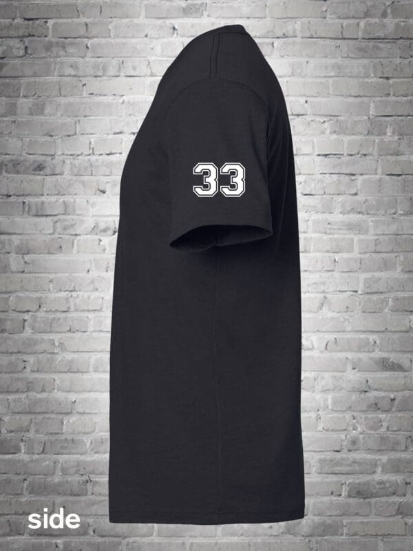 A black shirt with the number 3 3 on it.