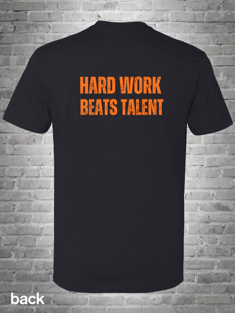 A black t-shirt with the words " hard work beats talent ".