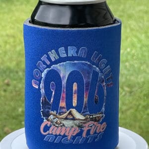 A can of beer is sitting on the ground.