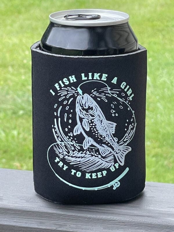 A can holder with an image of a fish on it.